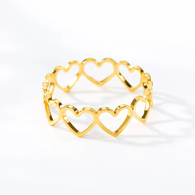 Gold-Colored Stainless Steel Heart Rings: Perfect for Engagement and Wedding Celebrations.