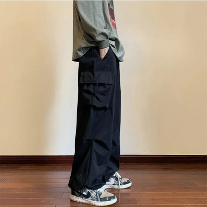 Streetwear Spring Harem Casual Pants Men Elastic Waist Solid Color Cargo Pants Multi Pocket Loose Baggy Pants For Women