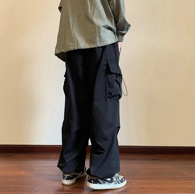 Streetwear Spring Harem Casual Pants Men Elastic Waist Solid Color Cargo Pants Multi Pocket Loose Baggy Pants For Women